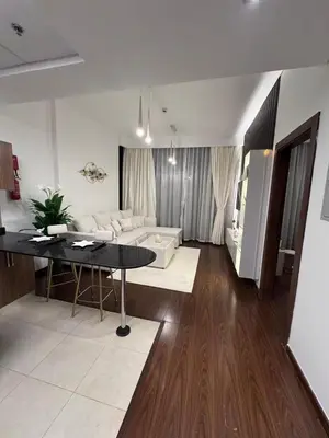 a living room with a couch and a table at Live a life of luxury in Dubai