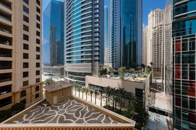 a view of a city with tall buildings at Cozy 1BR apartment in JBR in Dubai