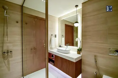 a bathroom with a sink and a shower at Luxury Escapes - Luxurious 2-Bedroom Apartment with Stunning Lake Views in JBR in Dubai
