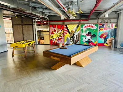 a room with a pool table and a ping pong ball at Sunny 1 Bedroom Apartment in Dubai Hills Estate in Dubai