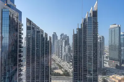 a view of a city skyline with tall buildings at Luxury Apartment in the Heart of Downtown Dubai in Dubai