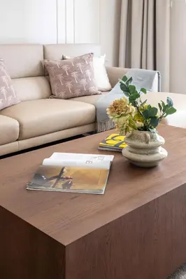 a coffee table in a living room with a couch at Frank Porter - Escan Tower in Dubai
