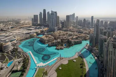 an aerial view of a city with a river at Frank Porter - Grande Signature Residence in Dubai