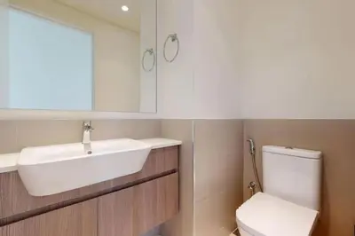 a bathroom with a sink and a toilet at Vacay Lettings -2 bed at Park ridge Dubai Hills in Dubai