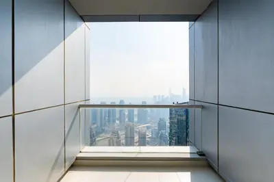 an empty room with a view of a city at Classy Upgraded - High Floor - Prime Location in Dubai
