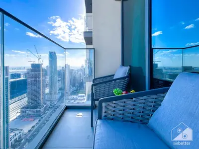 a balcony with a view of a city at Burj Royale Luxury One-Bedroom with City Views in Dubai