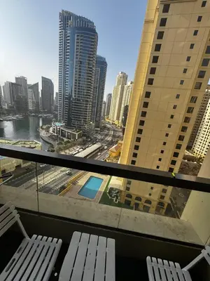 a view of a city from a balcony of a building at TWIN BED-ROOM Sadaf Community near TRAM in Dubai