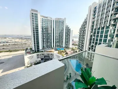 a balcony with a view of some tall buildings at Creek view studio deleguest in Dubai