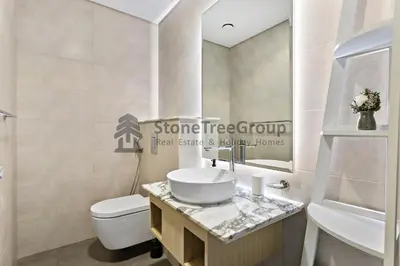 a bathroom with a sink and a toilet at Stonetree - Spacious 2BR in Paramount in Dubai
