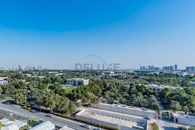 an aerial view of a city with a highway at Elegant 2BR in Sky Gardens DIFC by Deluxe Holiday Homes in Dubai