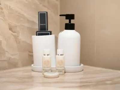 a group of products sitting on top of a counter at Kensington Stylish 1BR at The Lofts East Downtown in Dubai