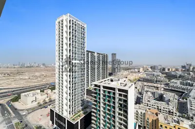 an overhead view of a tall building in a city at High-Floor and Spacious 1BR at Binghatti Emerald in Dubai
