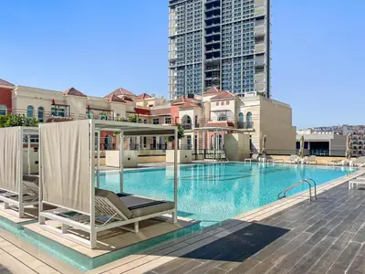 a swimming pool on top of a building at Modern and High Floor 1BR at Binghatti Emerald in Dubai