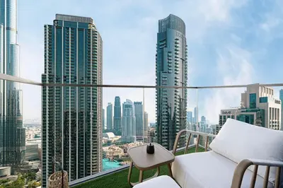 a balcony with a view of a city skyline at Luxury 4BR Burj Khalifa View Dubai Mall in Dubai