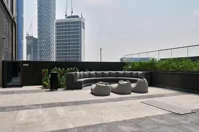 a couch sitting on top of a building at Studio Revved Up in 15 Northside with Pool and Gym in Dubai