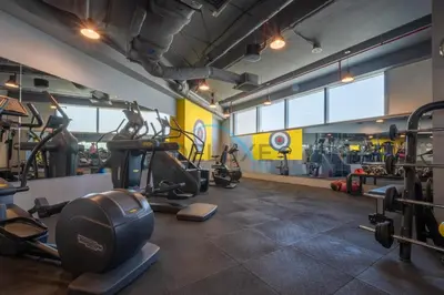 a gym with treadmills and machines in a room at Delightful 2BR at Sky Gardens DIFC by Deluxe Holiday Homes in Dubai