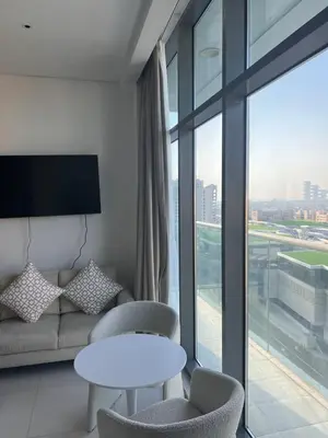 a living room with a couch and a table at Suite in Seven Palm Corner Unit Rooftop Floor in Dubai