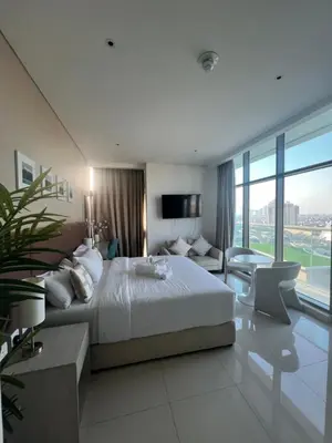 a bedroom with a large bed and a large window at Suite in Seven Palm Corner Unit Rooftop Floor in Dubai