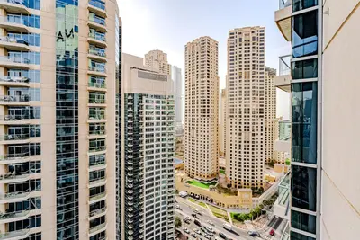 a view of a city with tall buildings at Breathtaking 1BDR Apartment in Dubai Marina I Bonair I Park Islands in Dubai