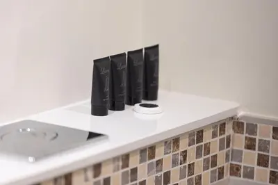 a bathroom counter with a sink and a counter top at Exclusive 1-Bedroom Apartment with Breathtaking Burj Khalifa Views in the Heart of Dubai in Dubai