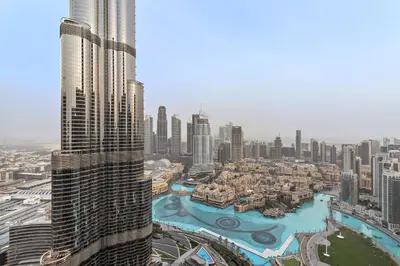 an aerial view of a city with tall buildings at 2BR Address Opera, Full Burj Khalifa View in Dubai