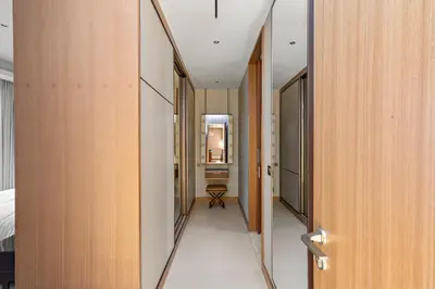 a hallway of a hotel room with a mirror at 2BR Address Opera, Full Burj Khalifa View in Dubai