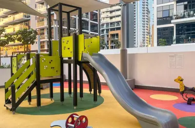 a playground with a slide in a building at Elite LUX Holiday Homes - Upscale Studio in Azizi Riviera Prime Location Dubai in Dubai