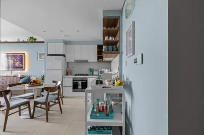 a kitchen and dining room with a table and chairs at Front Row Burj Khalifa Views - Dubai Mall Access - Premium 2BDR in Dubai