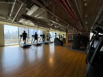 a group of people doing pilates in a gym at Amazing view Burj Khalifa 5mn Dubai Mall 2BDR in Dubai