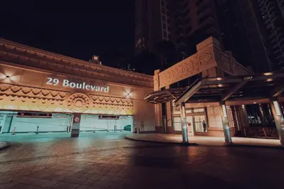 a building with a sign on the front of it at Elegant Studio Downtown 5 Minute Walk to Burj Khalifa & Dubai Mall in Dubai