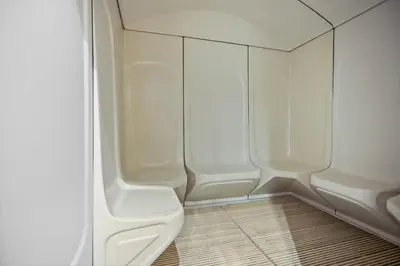 a small bathroom with white walls and a toilet at Chic JLT Studio Lake View Metro 5min Marina in Dubai