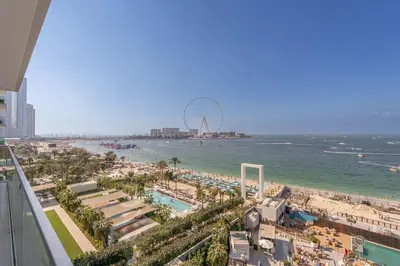 a view of the beach and the ferris wheel at Beautiful 2 Bedroom Sea Views at La Vie JBR in Dubai