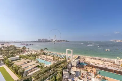 a view of the beach and the ferris wheel at Beautiful 2 Bedroom Sea Views at La Vie JBR in Dubai