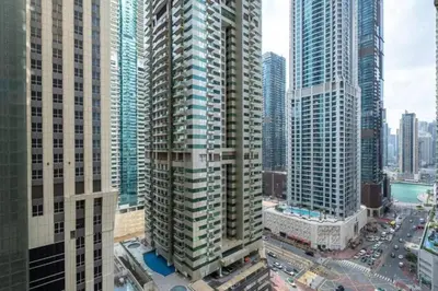 an aerial view of a city with tall buildings at 1BHK in central of Dubai Marina in Dubai