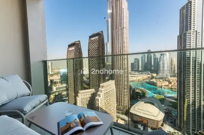 a balcony with a view of a city at Unit Overlooking Burj Khalifa and Fountain View in Dubai