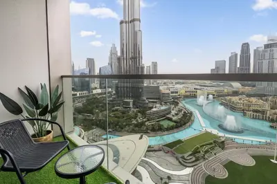 a balcony with a view of a city at GRANDE SIGNATURE- 2BR Apartment with full Burj Khalifa views in Dubai