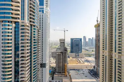 an aerial view of a city with tall buildings at GuestReady - Contemporary living in Dubai Marina in Dubai
