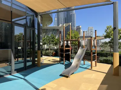 a playground with a slide in a building at Downtown Luxury - Elegant 1-Bedroom Apartment - 5 Minutes Walk to Dubai Mall in Dubai