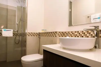 a bathroom with a sink and a toilet and a shower at HiGuests - Vibrant 1BR in Business Bay in Dubai