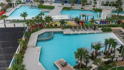 an overhead view of a pool at a resort at Sky-High Aykon City Studio in Dubai