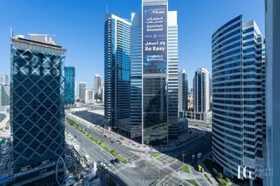 a view of a city with tall buildings and traffic at Spacious Studio in Damac Maison Prive Canal Views in Dubai