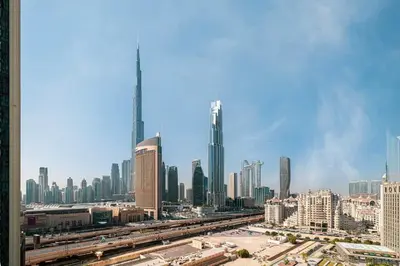a view of a city with buildings and train tracks at Luxury 2BR Burj Khalifa View Dubai Mall in Dubai