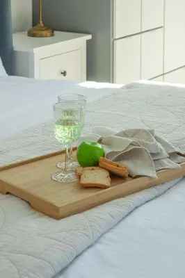 a tray with a wine glass and bread and cheese at Frank Porter - Address JBR in Dubai