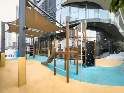 a playground in a building with a slide at Signature Series 1 Bedroom Apartment I Free Parking, Gym, Pool I PlayStation 5 I by Skyline Serenity in Dubai