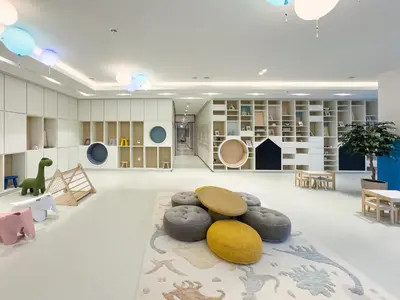 a large room with furniture and a room with a rug at Signature Series 1 Bedroom Apartment I Free Parking, Gym, Pool I PlayStation 5 I by Skyline Serenity in Dubai