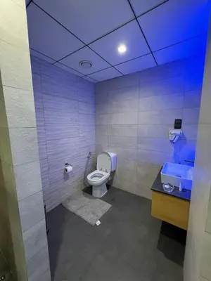 a bathroom with a toilet and a sink at Luxurious JBR Beach Facing 4BHK in Dubai