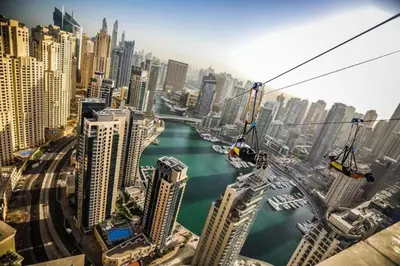 a view of a city with a river and buildings at Ahlan Premium Luxury Marina Cityview JBR in Dubai