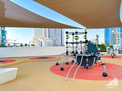 a metal object sitting on top of a building at Luxury One Bedroom with Balcony & partial Burj Khalifa View in Dubai