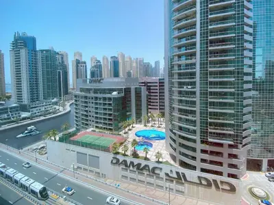 an aerial view of a city with tall buildings at Studio near beach and Metro in Dubai Marina Z1003 in Dubai