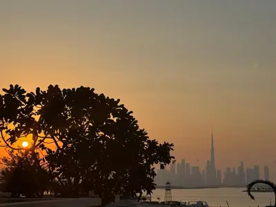 a view of the dubai skyline at sunset at 1bedroom Apartment With Stunning view Creek Harbour in Dubai